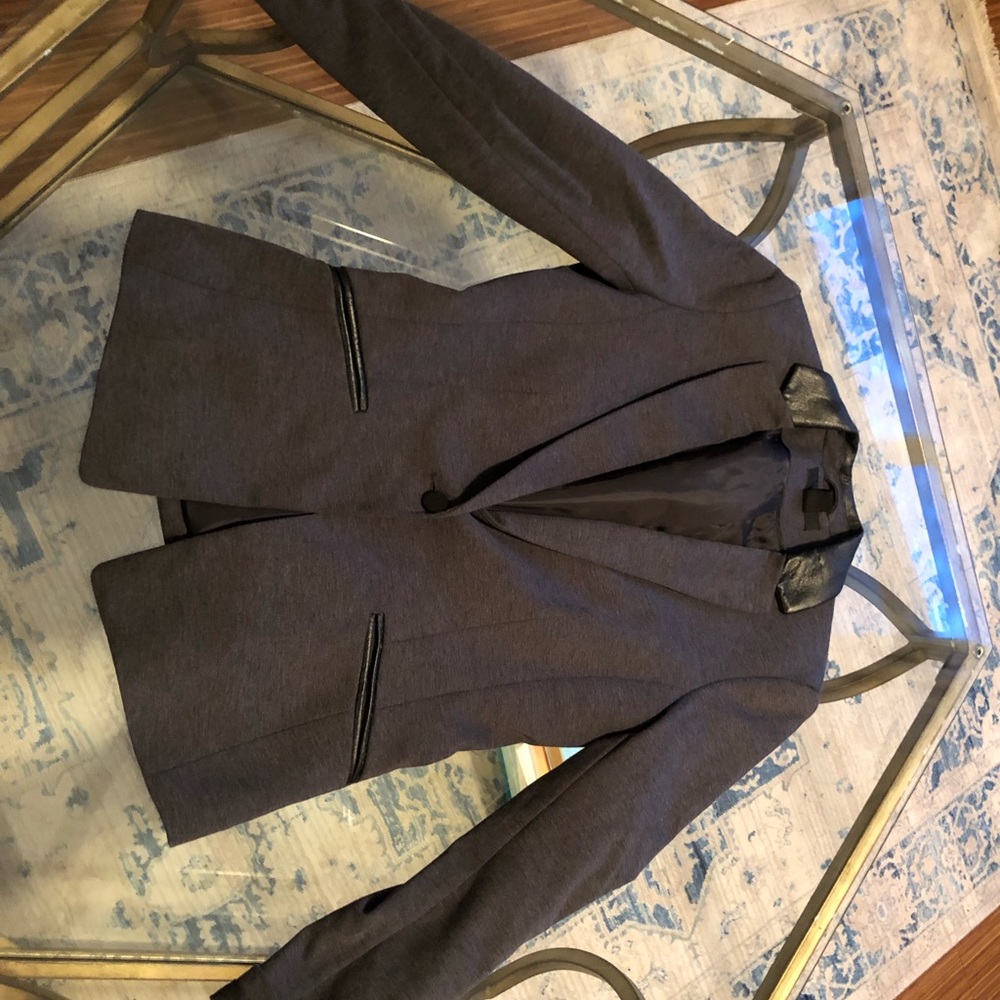 Grey jacket with foe leather collar